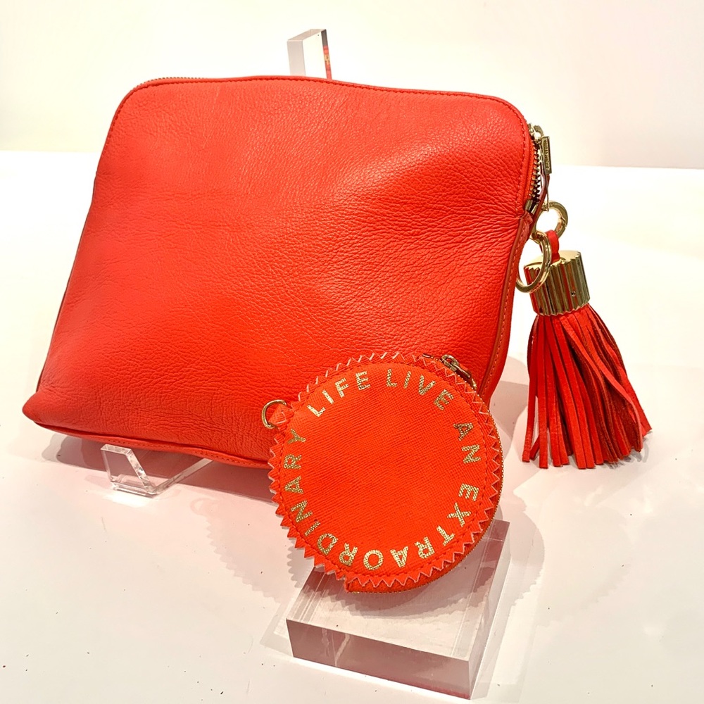 Cute coral colored India Hiks Clutch